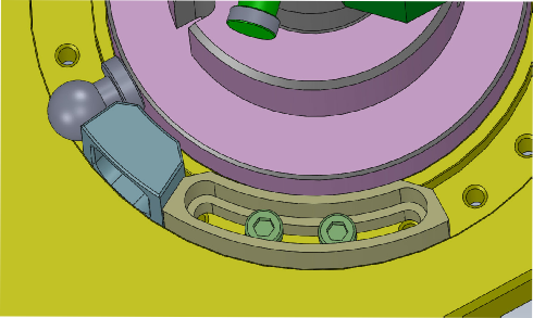 Spring Torque Fixture: Showing the guage in place that sets the distance for the spring being tested. 