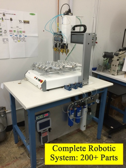 Robotic Gel Dispense System: Does 12 Sensors in One Setup using a Fisnar robot with 4 Nordson valves.