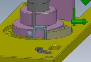Spring Torque Fixture: Pockets to store the accessories are built in to the base. 