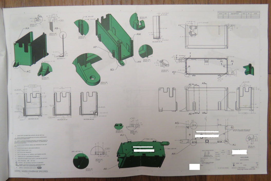 Plastic Injection Part: Two of these boxes would snap together, then two large heat sinks would snap on top. 